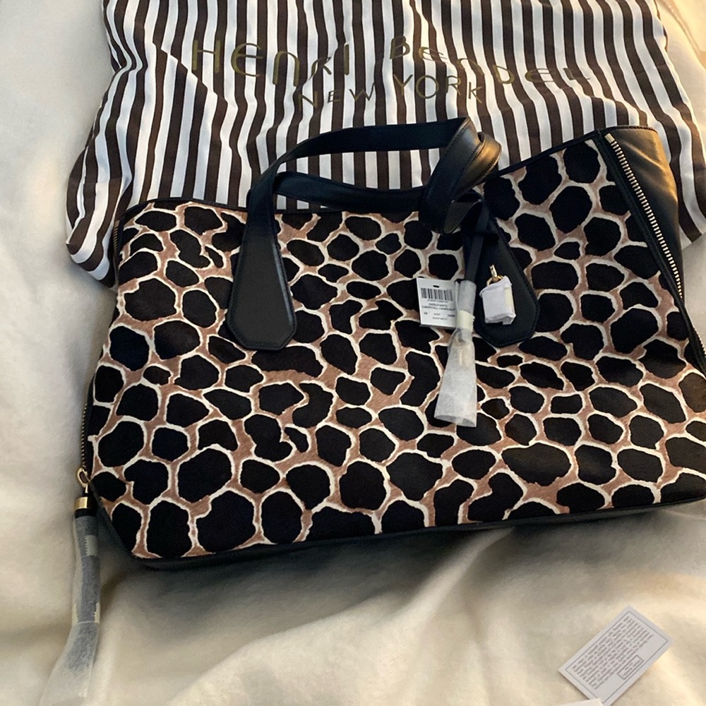 Henri Bendel rare Debutante tote in Haircalf.  Store fresh. Still wrapped.